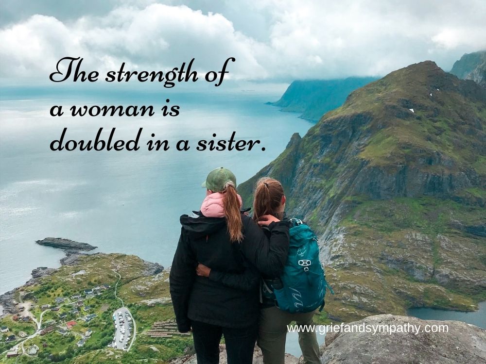 Quote - The strength of a woman is doubled in a sister.  Two sisters looking at the ocean and cliffs.