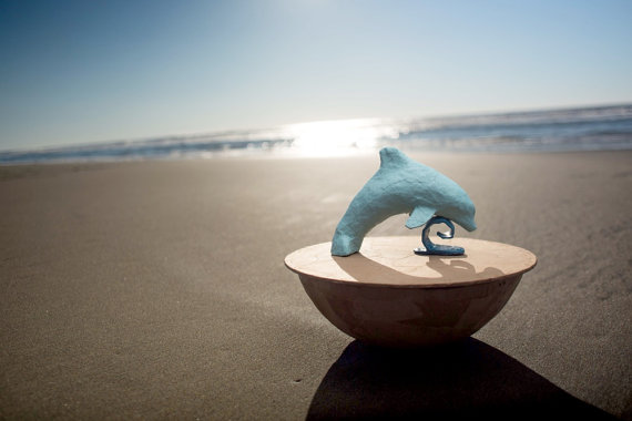 Biodegradable dolphin urn by Laura Bruzzese