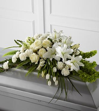 White Funeral Casket Spray with Lilies, Roses, tulips.