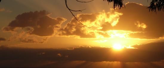 Orange sunset illustrating the grief of a child