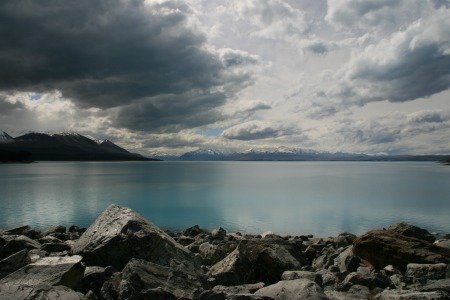 Moody Lake in NZ reflecting the turbulence of grief for a father