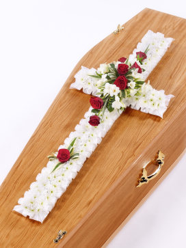 White Cross Casket Flowers with Red Roses