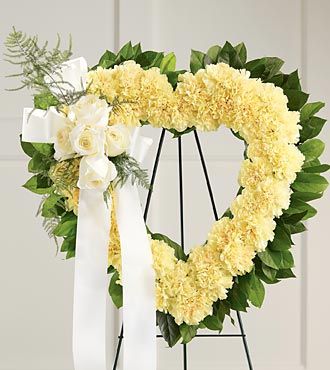 Yellow Heart Shaped Flowers with Carnations and Ivory Roses