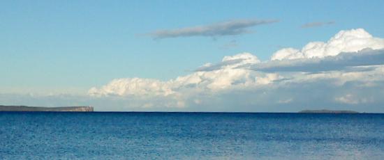 Sea and white clouds, a calming scene for comfort in bereavement