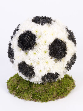 English Football Funeral Flowers in Black and White with Green Moss Grass Base