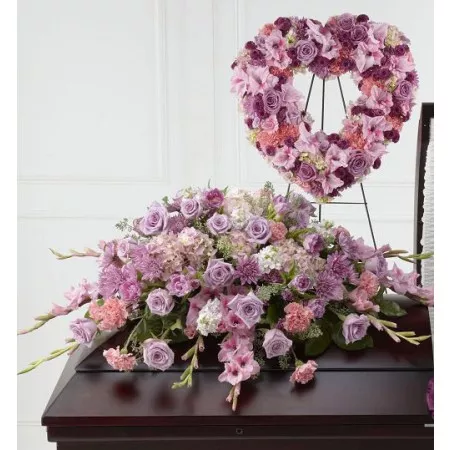 Pink funeral flowers with heart