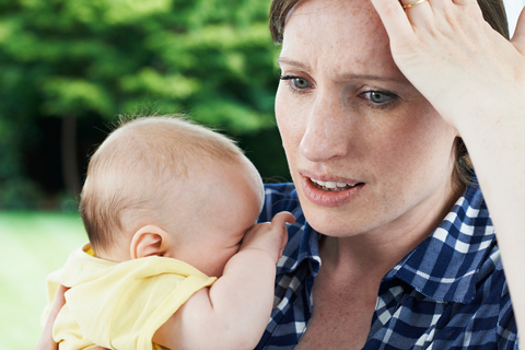 Sad woman with child after divorce