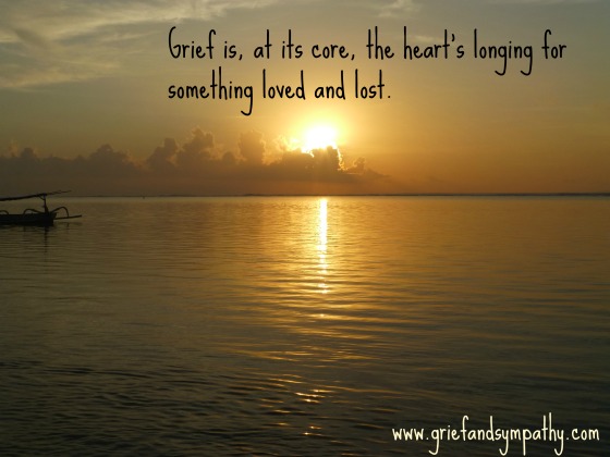 Dark yellow sunrise with quote answering the question What does grief mean?