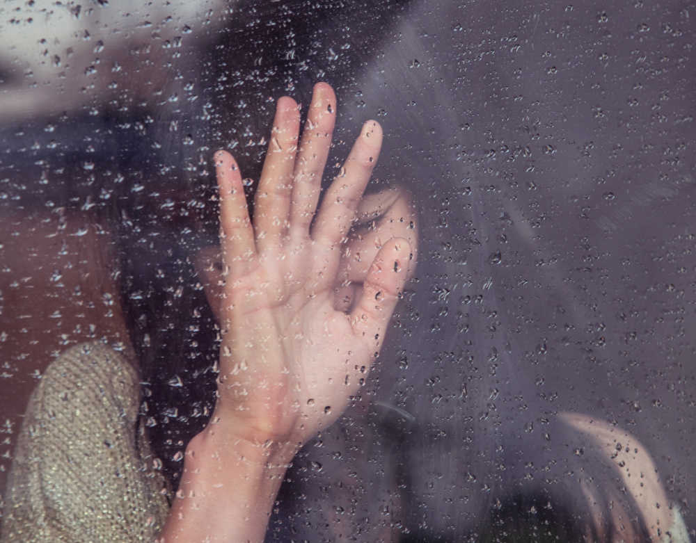 Woman grieving the loss of a brother